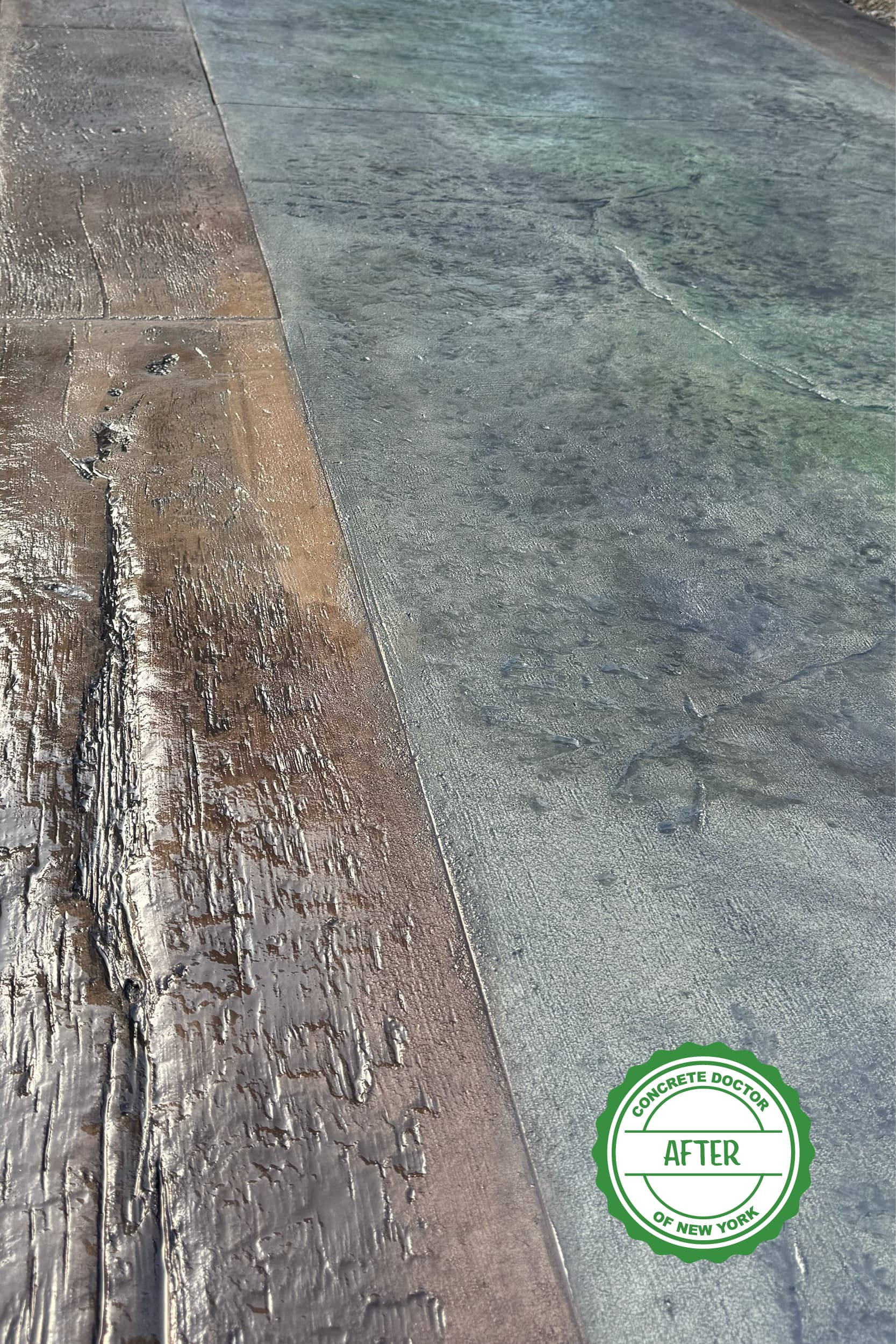 Finished stamped concrete walkway with a natural stone pattern and wood plank border