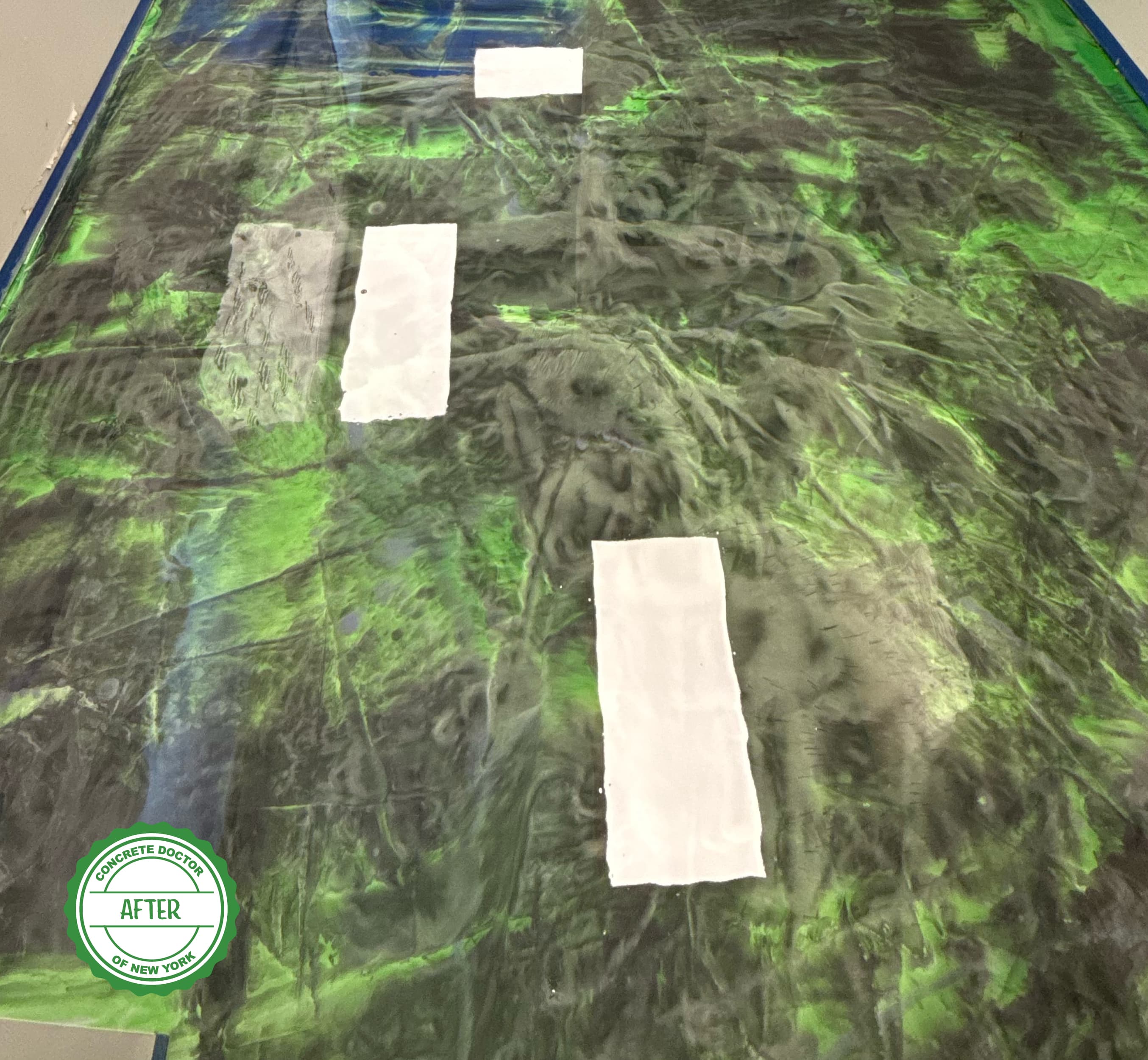 Custom logo-colored epoxy flooring detail in a Bullville, NY office