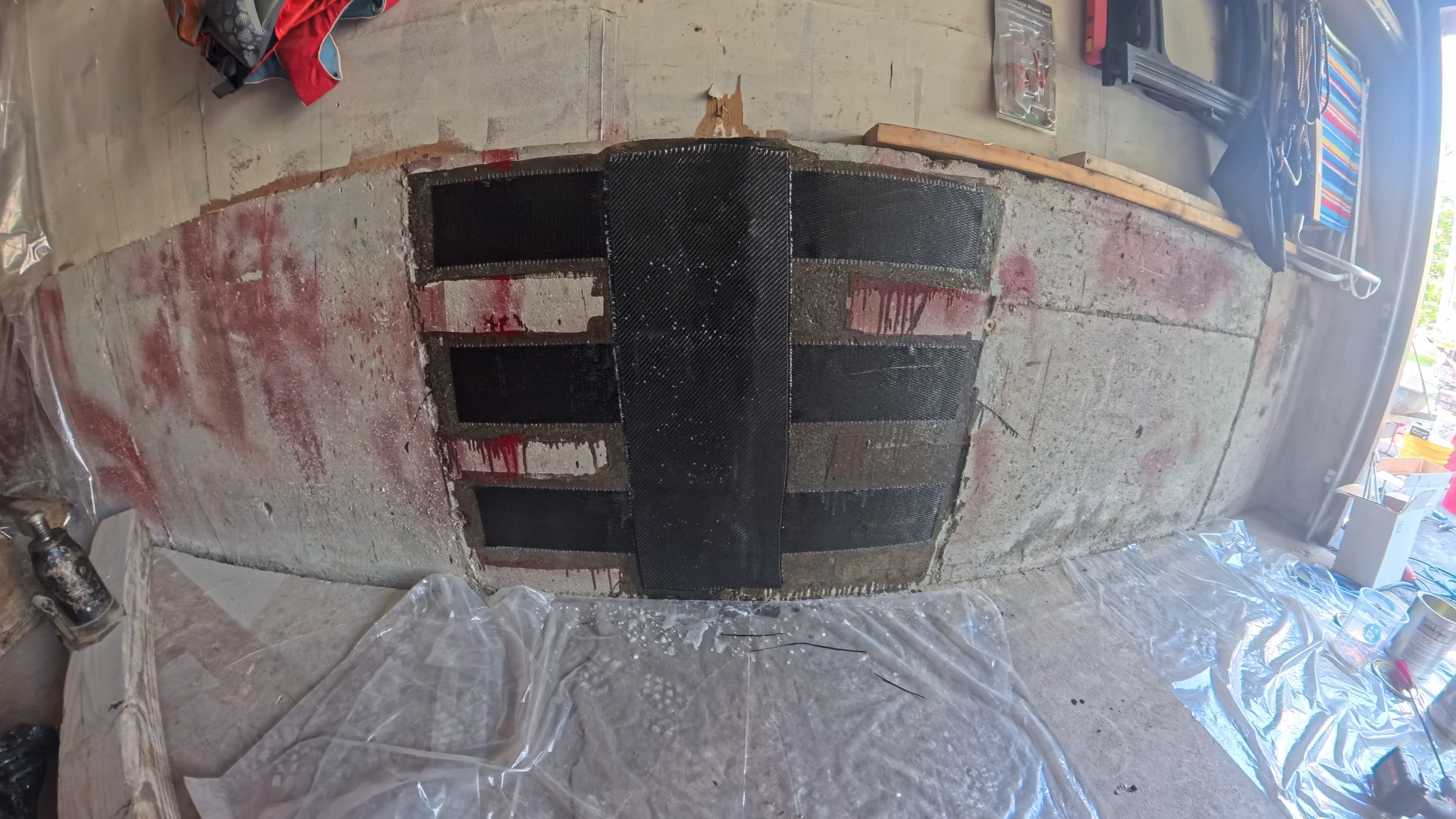 Garage foundation wall reinforced with SRS carbon fiber strips after repair in Washingtonville, NY