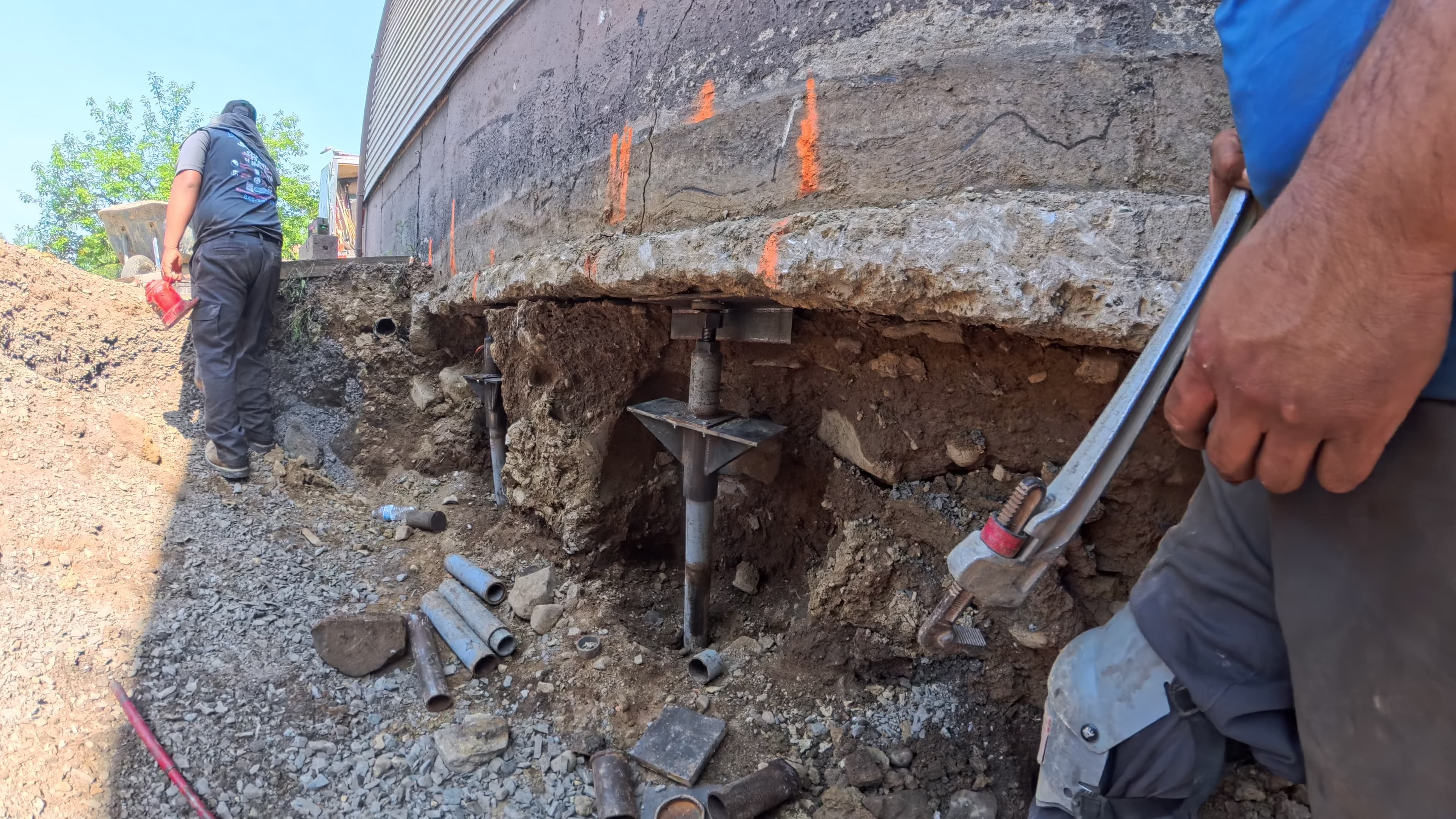 Push pier head assembly supporting the garage footing in Washingtonville, NY