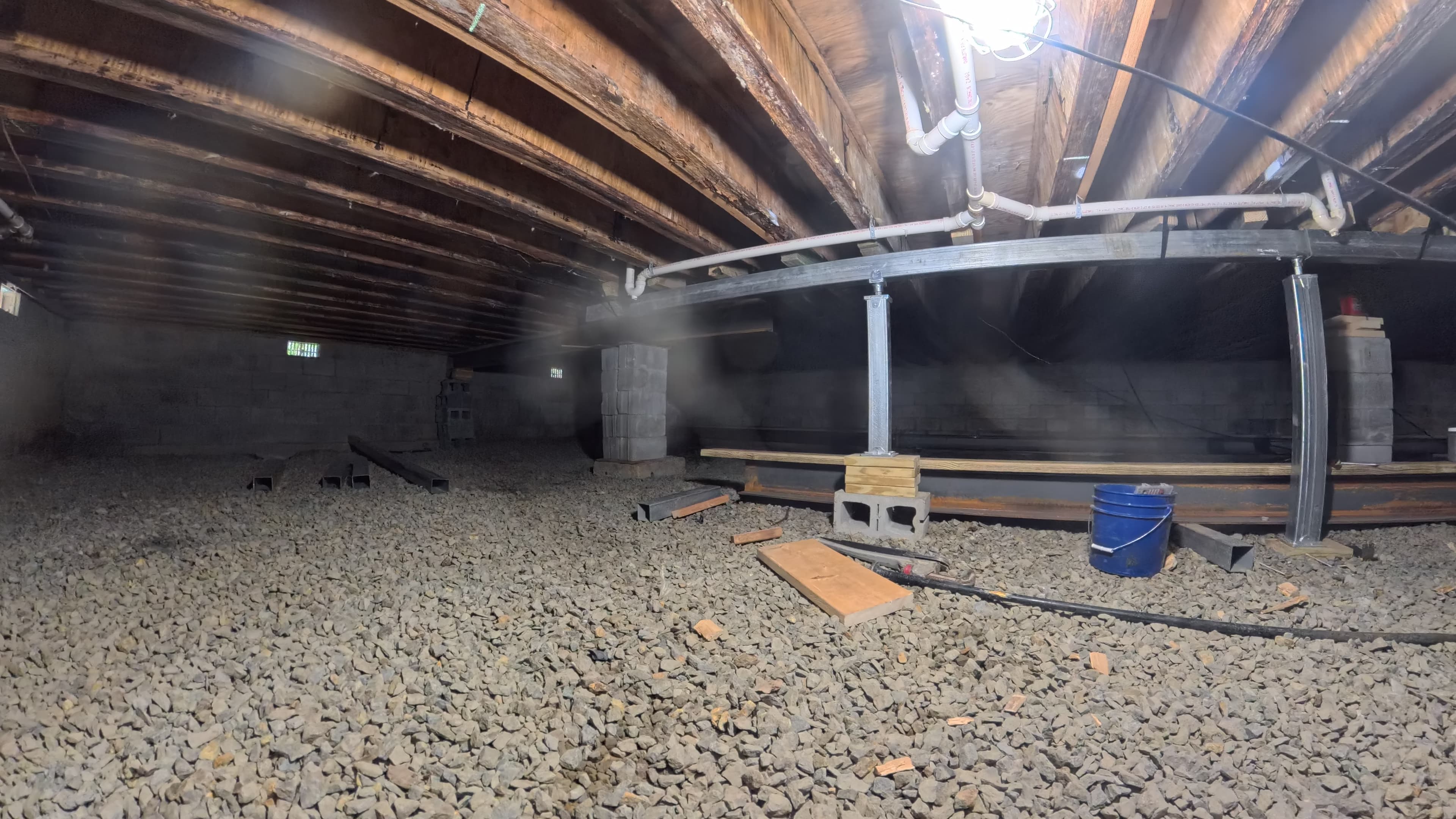 Steel support post set on a concrete pad beneath the new beam line in Barryville, NY