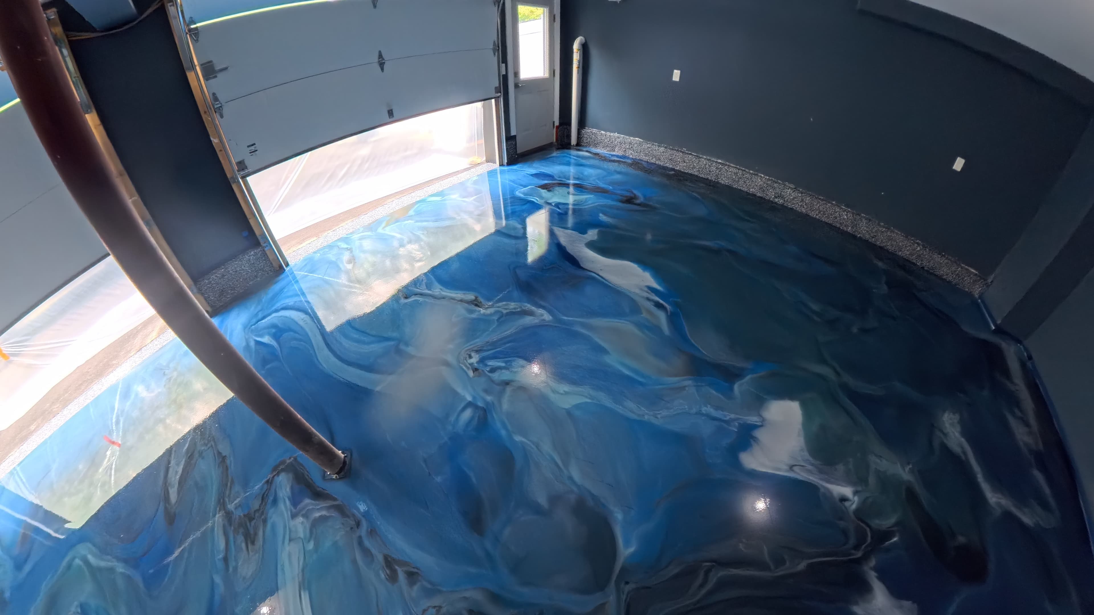 Finished Bugaloo Blue metallic epoxy garage floor in Wallkill, NY