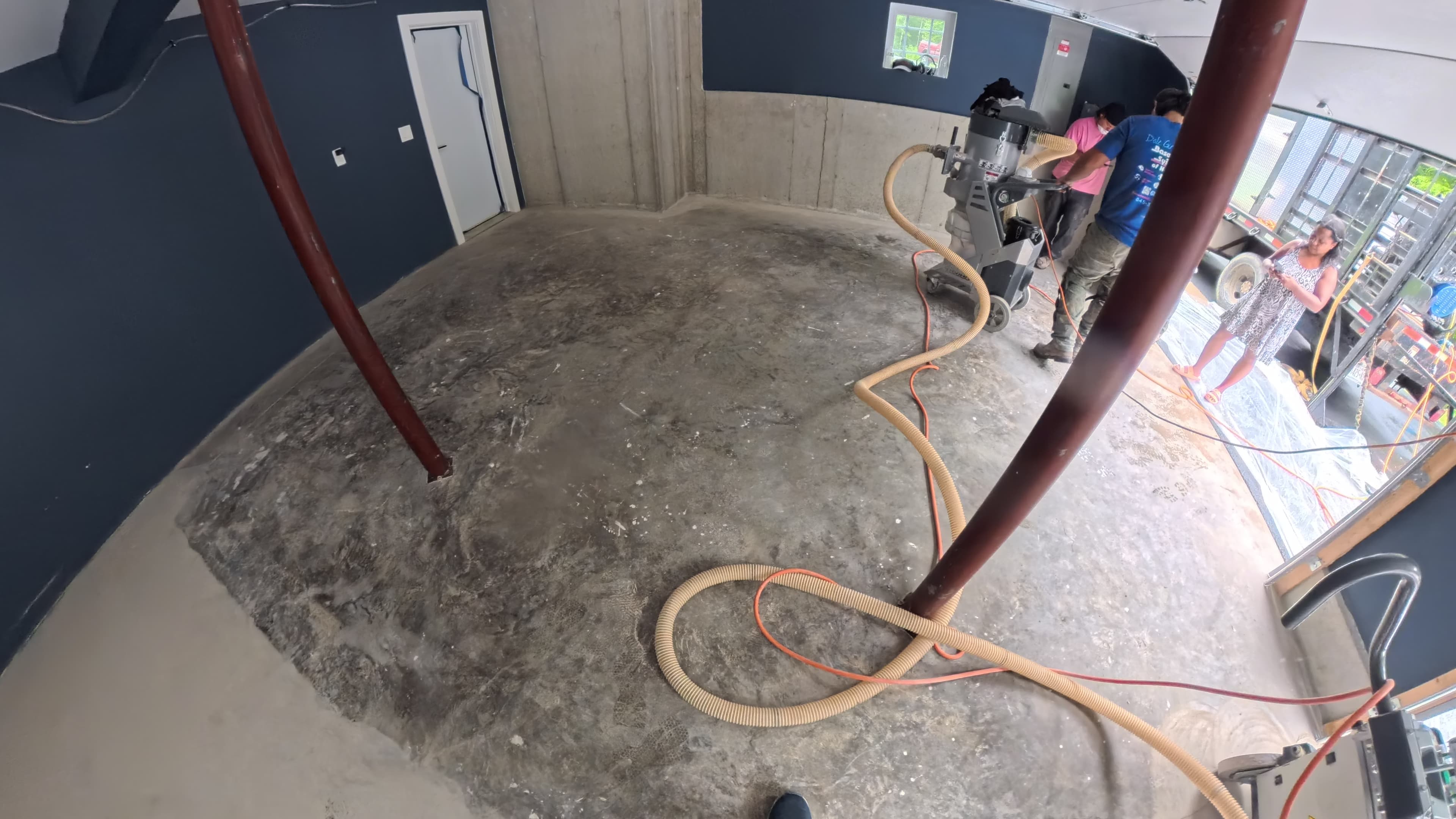 Crew grinding the garage concrete to a CSP-3 profile in Wallkill, NY