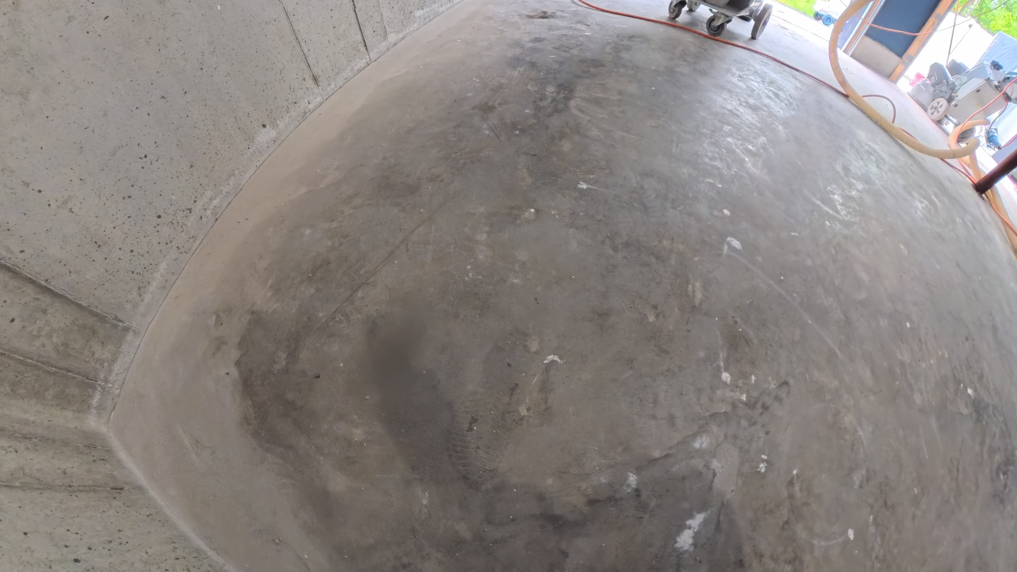 Ground concrete garage floor prepared for the moisture vapor barrier in Wallkill, NY