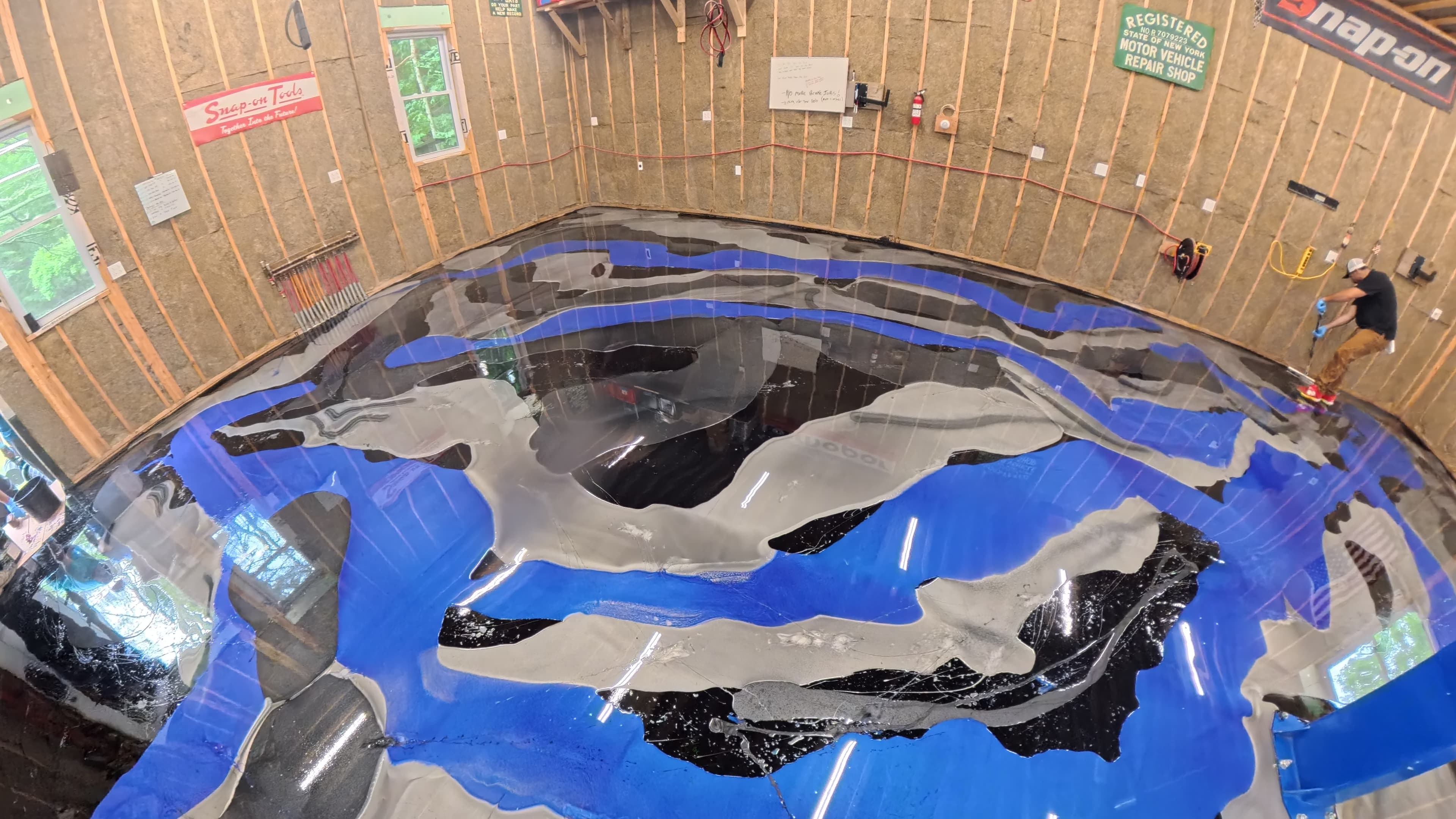 Layers of custom-pigmented epoxy poured across the shop floor in Kerhonkson, NY